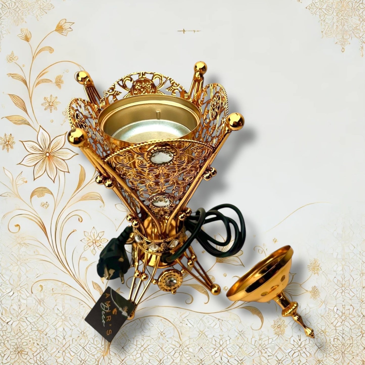 Elektrischer Weihrauchbrenner mit arabesken Goldmustern, dekorativen Edelstein-Elementen und praktischem Netzstecker. Ideal für stilvolle Duftverbreitung.