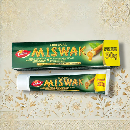  Dabur Miswak Zahnpasta Inhaltsstoffe auf grüner Verpackung, vegane Formel mit Miswak-Extrakt