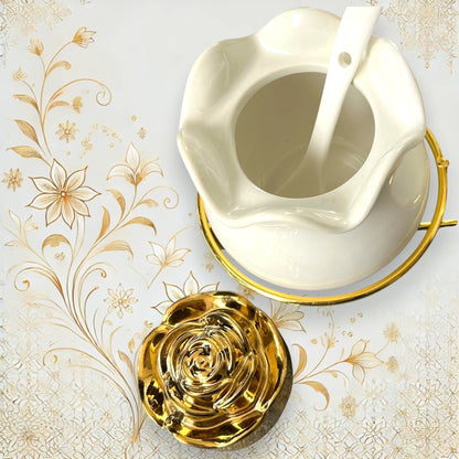 Weiße Porzellandose mit goldenem Rosendeckel, Löffel und dekorativem Halter