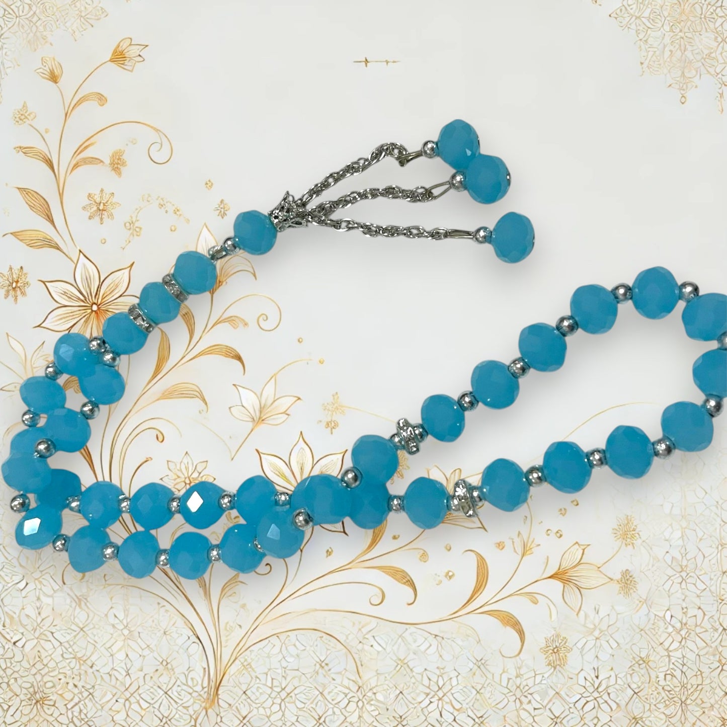  Elegante hellblaue Tesbih Gebetskette mit 33 funkelnden Kristallsteinen und silbernen Details.