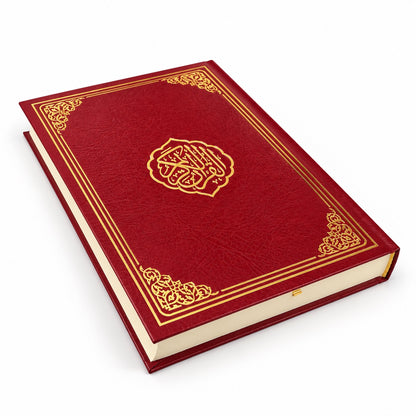 Roter Koran im Hardcover liegend mit goldfarbenen Verzierungen